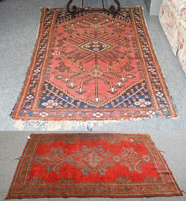 Lot 1004 - Ushak Rug, the blood red field with column of...