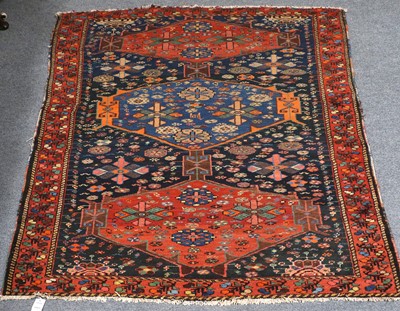 Lot 1001 - Bakhtiari Rug, the indigo field with three...