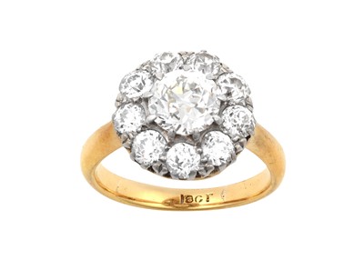 Lot 2289 - A Diamond Cluster Ring the raised central old...