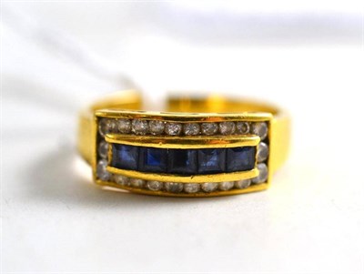 Lot 169 - An 18ct gold sapphire and diamond ring
