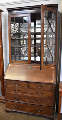 Lot 1031 - A George III Inlaid Mahogany Bureau Bookcase,...