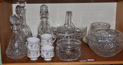 Lot 198 - A shelf including cut glass decanters and stoppers, an oval cut glass basket, bowls, Paragon...