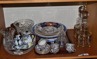 Lot 199 - A shelf including a modern brass mounted tantalus with two glass decanters and stoppers, plated...