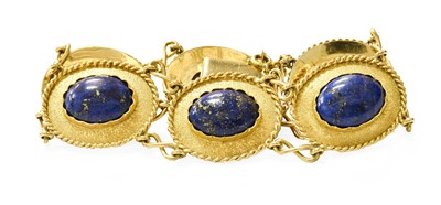 Lot 96 - A Lapis Lazuli Bracelet, six chain linked oval...