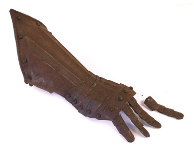 Lot 120 - A 17th Century Steel Gauntlet, the fluted...