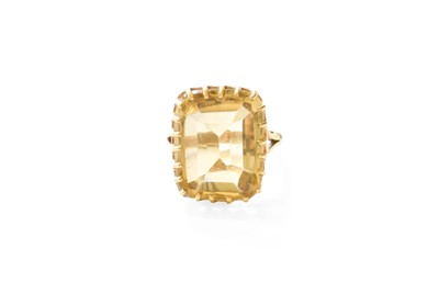 Lot 124 - A Citrine Ring, the rectangular cushion shaped...