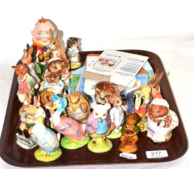 Lot 217 - Twenty Royal Albert Beatrix Potter figures, two Wade figures and a Doulton figure