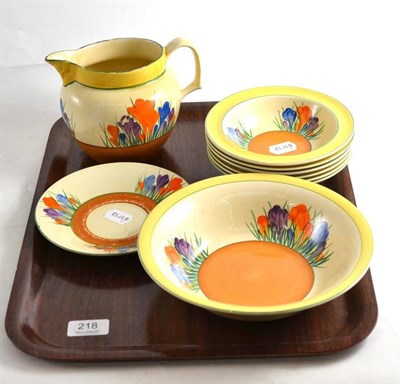 Lot 218 - A Clarice Cliff crocus pattern part set including bowl, six pudding plates, jug and saucer