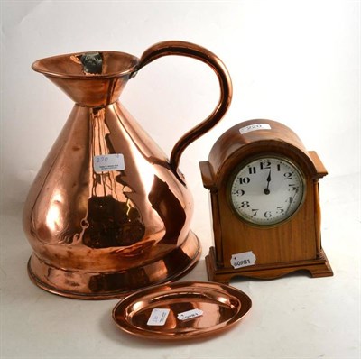 Lot 220 - A satin mahogany French mantel clock, a copper gallon measure and a copper dish