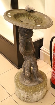 Lot 1452 - A Lead Figural Bird Bath, with dished top of...