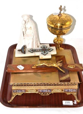 Lot 226 - A gilt metal chalice, a reading slope, two crucifixes and a pottery Madonna