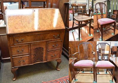 Lot 1373 - A Figured Walnut Bureau, with shell carved...