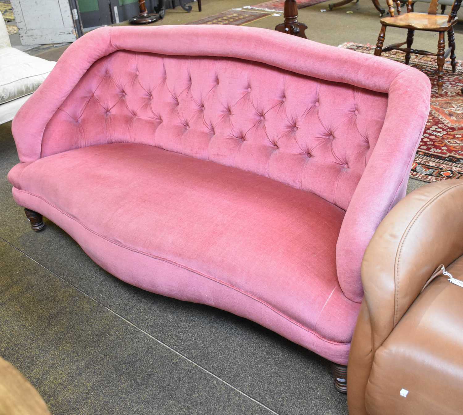 Lot 1154 - A Victorian Serpentine Two Seater Sofa, with...