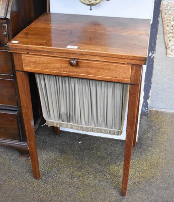 Lot 1404 - A Regency Mahogany Work Table, banded in...