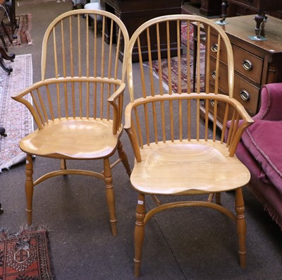 Lot 1321 - A Pair of Reproduction Treske Hardwood Windsor...