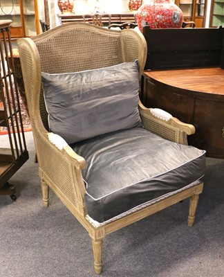 Lot 1424 - A French Double Caned Bergere Armchair, circa...