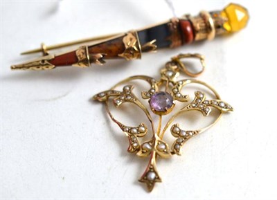 Lot 247 - A Scottish dirk brooch (a.f.) and an amethyst and seed pearl early 20th century pendant,...