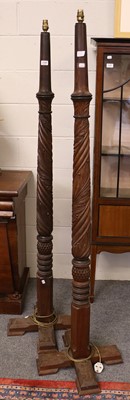 Lot 1240 - A Pair of Carved Mahogany Standard Lamps,...