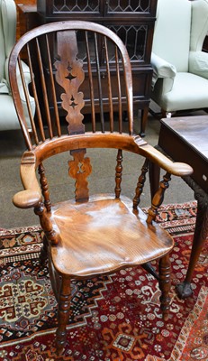 Lot 1355 - An Early 20th Century Elm Hoop Back Windsor Chair