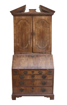 Lot 237 - A George II Walnut and Crossbanded Bureau...