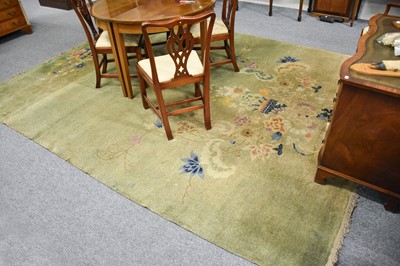 Lot 205 - Chinese Art Deco Carpet, the apple green field...