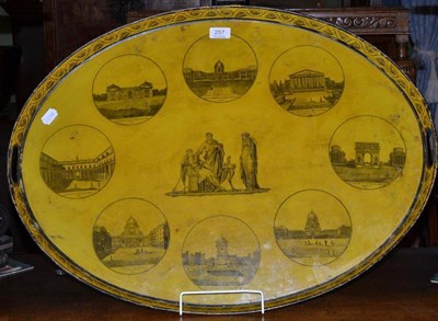 Lot 257 - French 19th century toleware oval serving tray depicting views of Paris with a glass mount, 76cm by