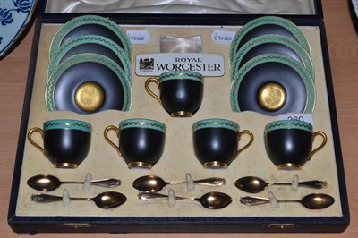 Lot 260 - A Royal Worcester cased coffee set (one cup missing) with six silver gilt spoons