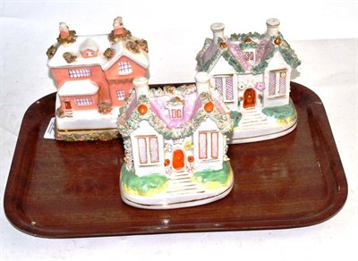 Lot 270 - Three Staffordshire house money boxes