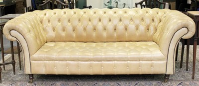 Lot 1040 - Distinctive Chesterfields: A White Buttoned...