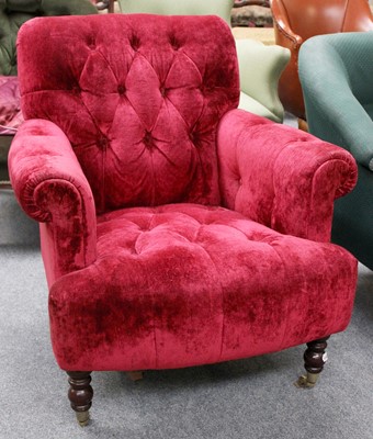 Lot 1149 - A Modern Buttoned Armchair, upholstered in...