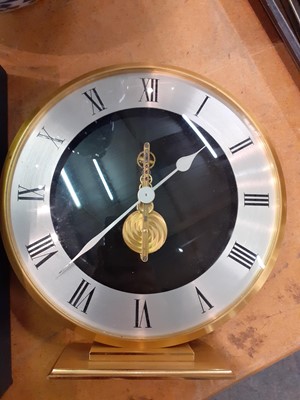 Lot 92 - A Cased Jaeger le Coultre, circular mantel clock