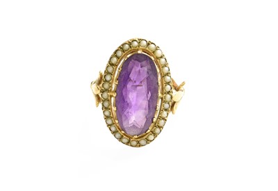 Lot 214 - A 9 Carat Gold Amethyst and Split Pearl Ring,...