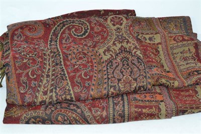 Lot 290 - A large woven red ground Paisley type shawl