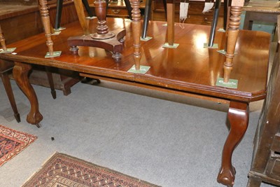 Lot 170 - A Victorian Mahogany Dining Table, on ball and...