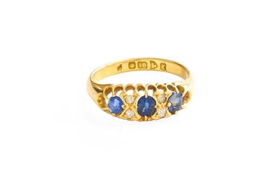 Lot 219 - An 18 Carat Gold Sapphire and Diamond Ring,...