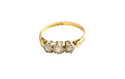 Lot 226 - A Diamond Three Stone Ring, the graduated old...