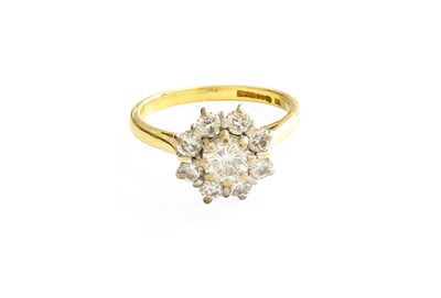 Lot 216 - An 18 Carat Gold Diamond Cluster Ring, the...