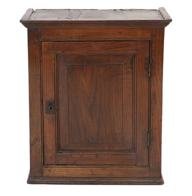 Lot 1071 - A George III Oak Wall-Mounted Cupboard, late...