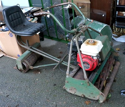 Lot 1286 - An Atco Vintage Ride On Lawn Mower, in working...