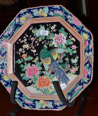 Lot 322 - An octagonal Japanese charger decorated with a peacock, 44cm diameter