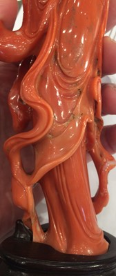 Lot 59 - ~ A Chinese Coral Figure of Guanyin, late...