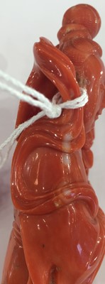 Lot 59 - ~ A Chinese Coral Figure of Guanyin, late...