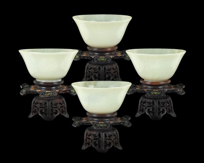 Lot 6 - ~ A Set of Four Chinese Pale Celadon Jade...