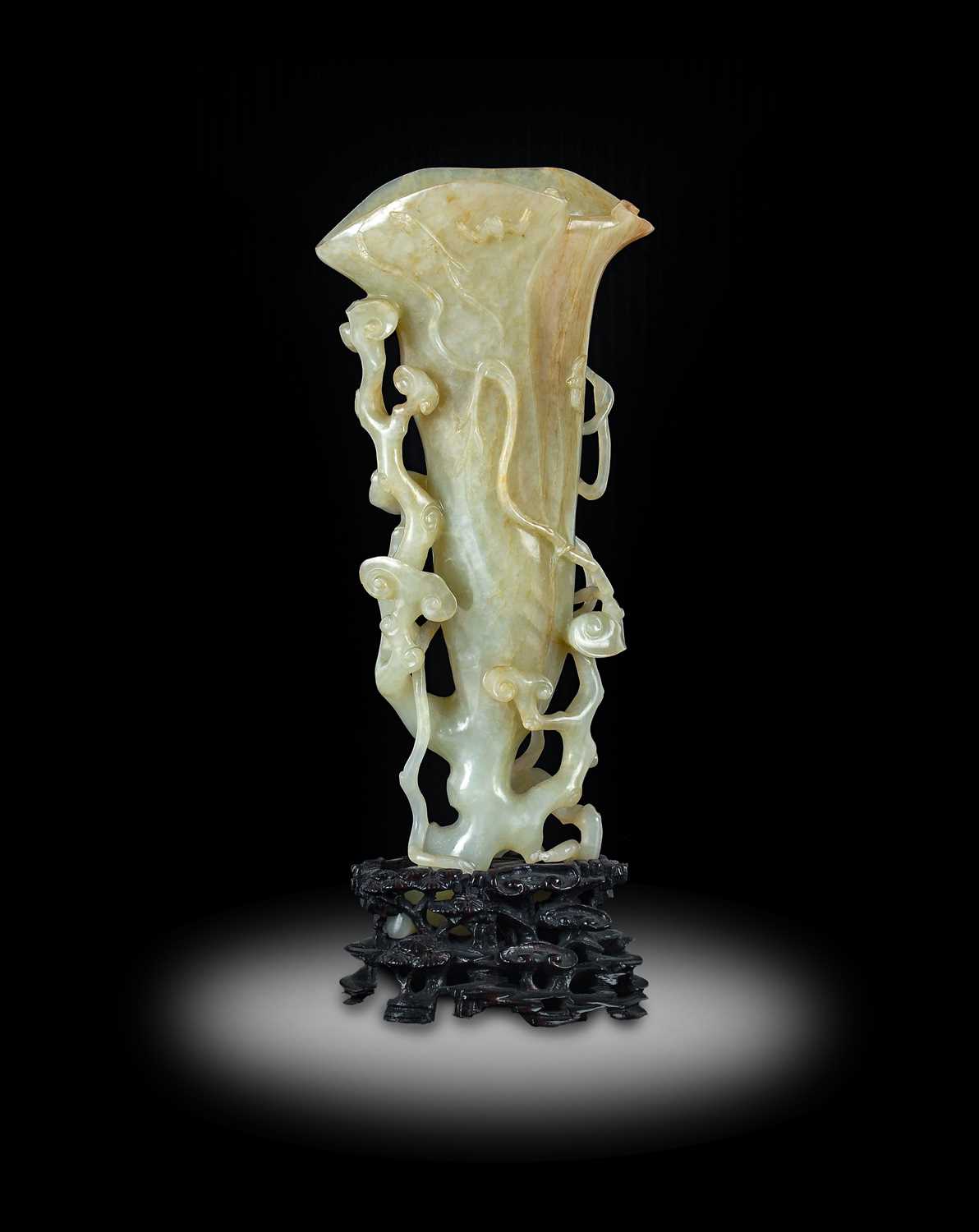 Lot 7 - ~ A Chinese Pale Celadon and Russet Jade Vase,...