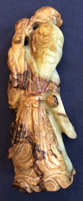 Lot 101 - A Chinese Pale Celadon and Mottled Brown Jade...