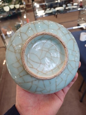 Lot 17 - ~ A Chinese Guan-Style Porcelain Bottle Vase,...