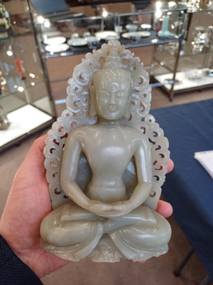 Lot 10 - ~ A Chinese Pale Celadon Jade Figure of Buddha,...