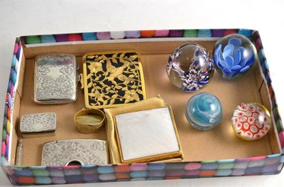 Lot 332 - Four glass paperweights, a silver pill box, cigarette case and calling card case, two compacts, etc