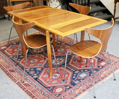 Lot 1081 - A Walnut Draw Leaf Table, 151cm by 77cm by...