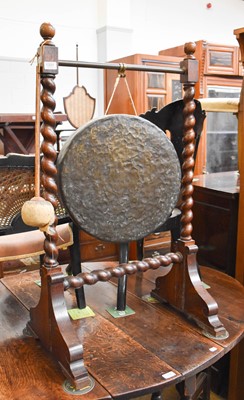 Lot 1331 - An Oak Framed Brass Dinner Gong, with barley...